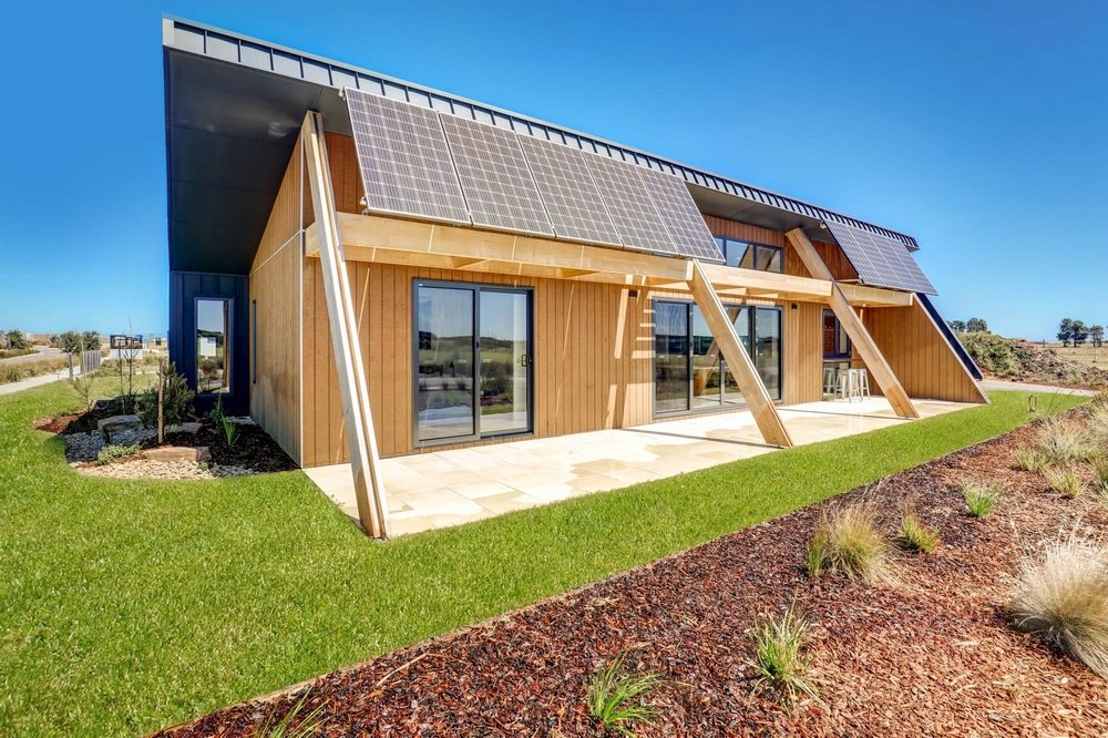 Core 9 has a timber-clad facade with visible solar panels.