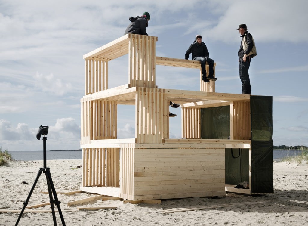 Timber boxes are stacked on top of each other to form one habitable Nomadic Shelter unit.