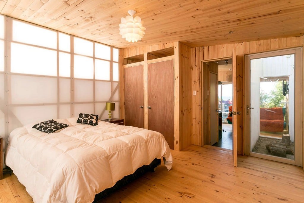 The interiors exude a homey, cozy vibe, thanks to a natural timber finish.