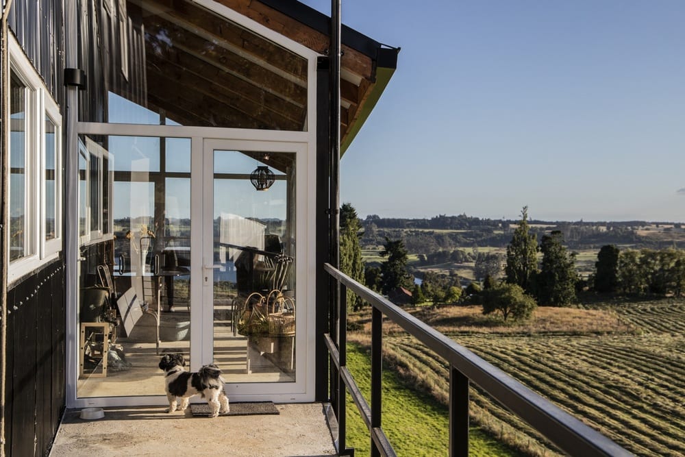 Large glass windows allow full, unrestricted views of the breathtaking landscape.