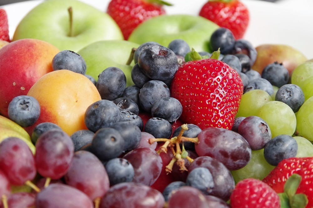 You can ripen fruit quicker by placing them in a container and completely covering them with uncooked rice.