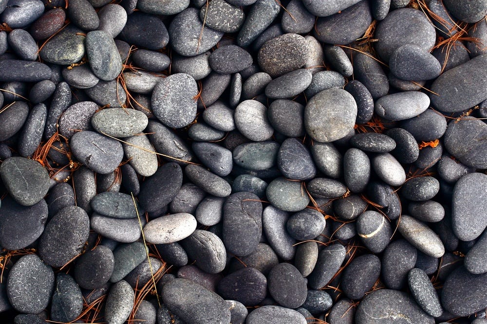 Our ancestors used stones to inhibit weed growth in their gardens some 10,000 years ago.