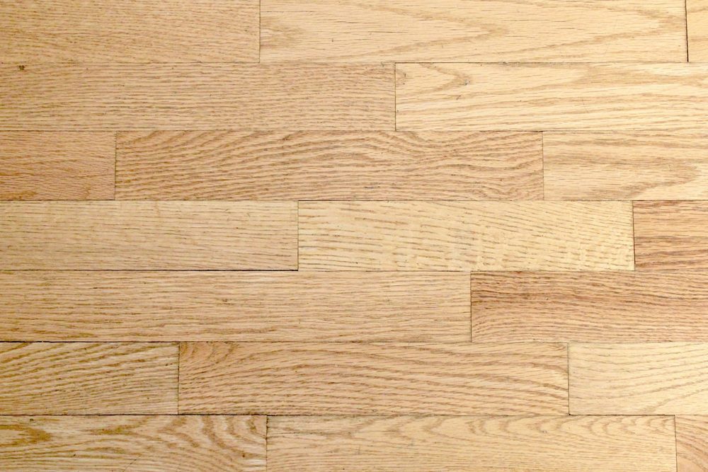 You can’t go wrong with a red, brown, gray, or white vinyl wood floor.