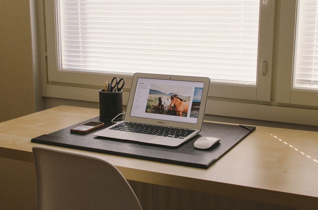 A wall-mounted desk is both convenient and functional.