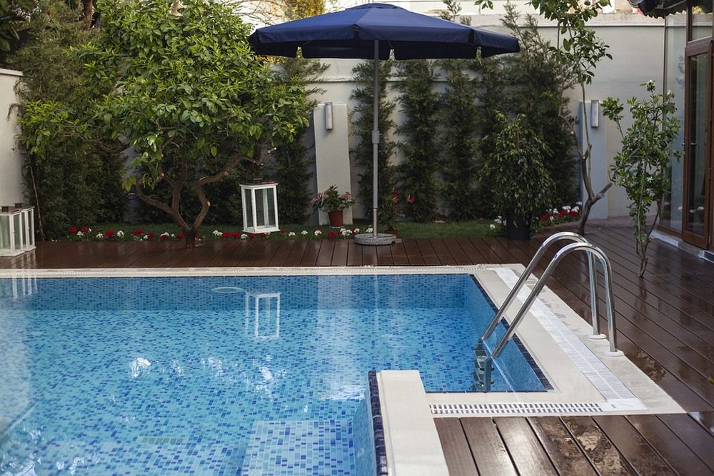 Here's what you need to know about incorporating a swimming pool into your existing exterior space.