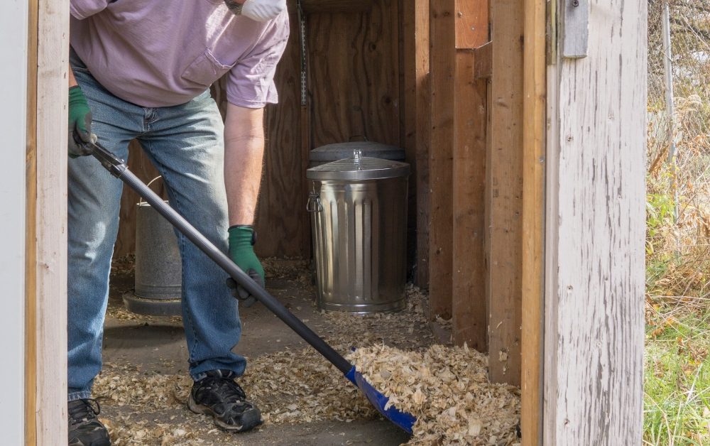 Before you start cleaning, relocate your chickens to a safe area outside the coop.