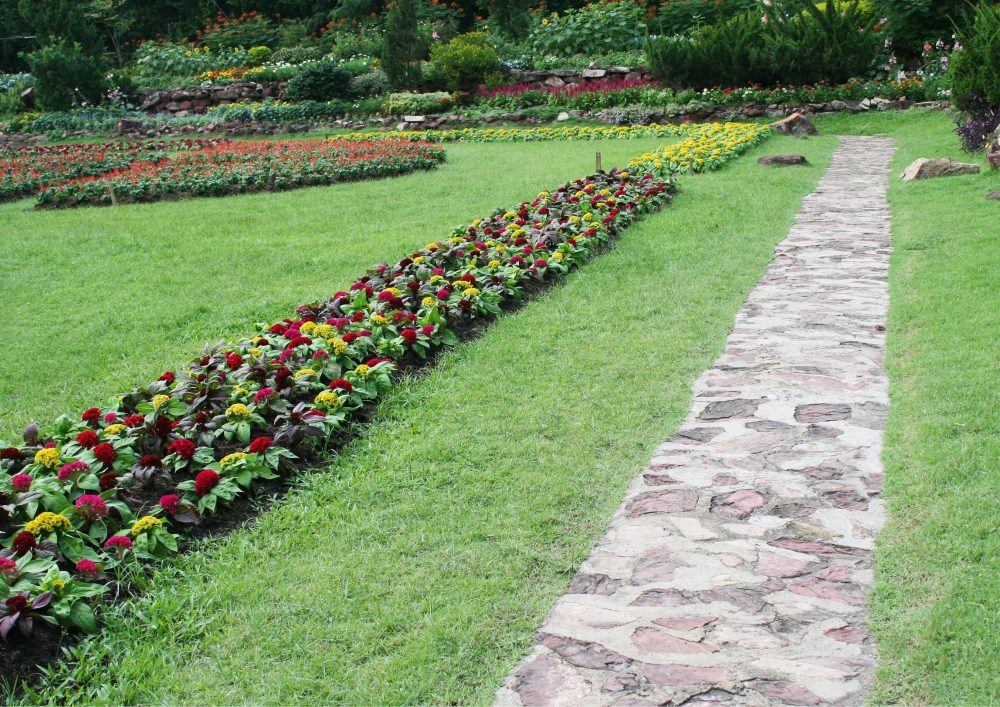 Stone pathways blend seamlessly with the natural elements of your landscape.