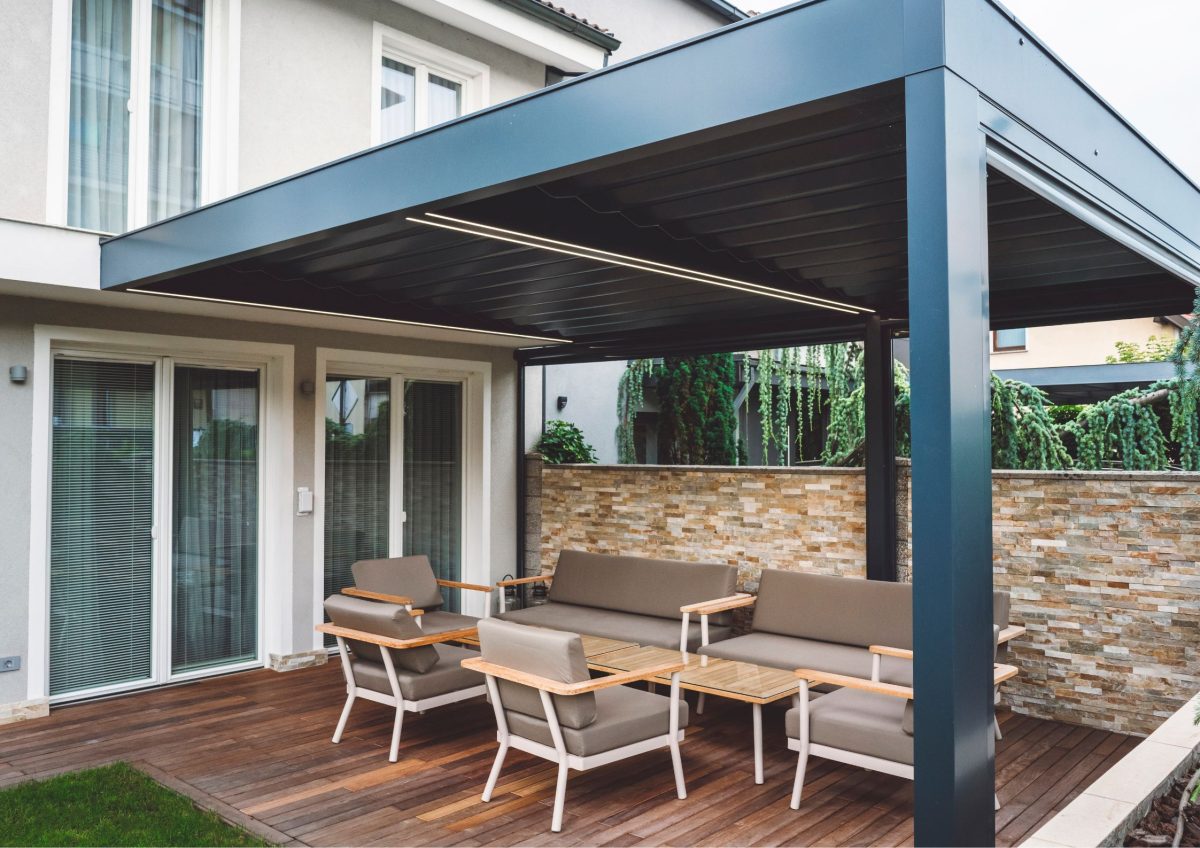 A covered patio provides shelter from the elements, allowing you to enjoy the outdoors regardless of weather conditions. 