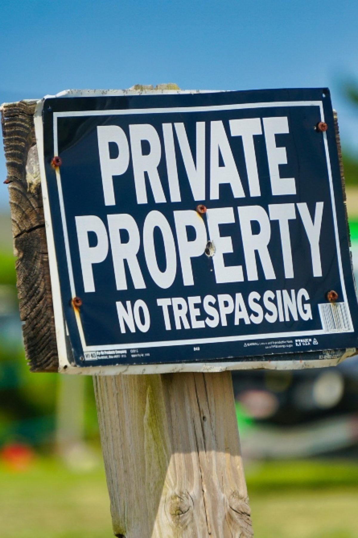 An image of a "private property" sign to prevent trespassers.