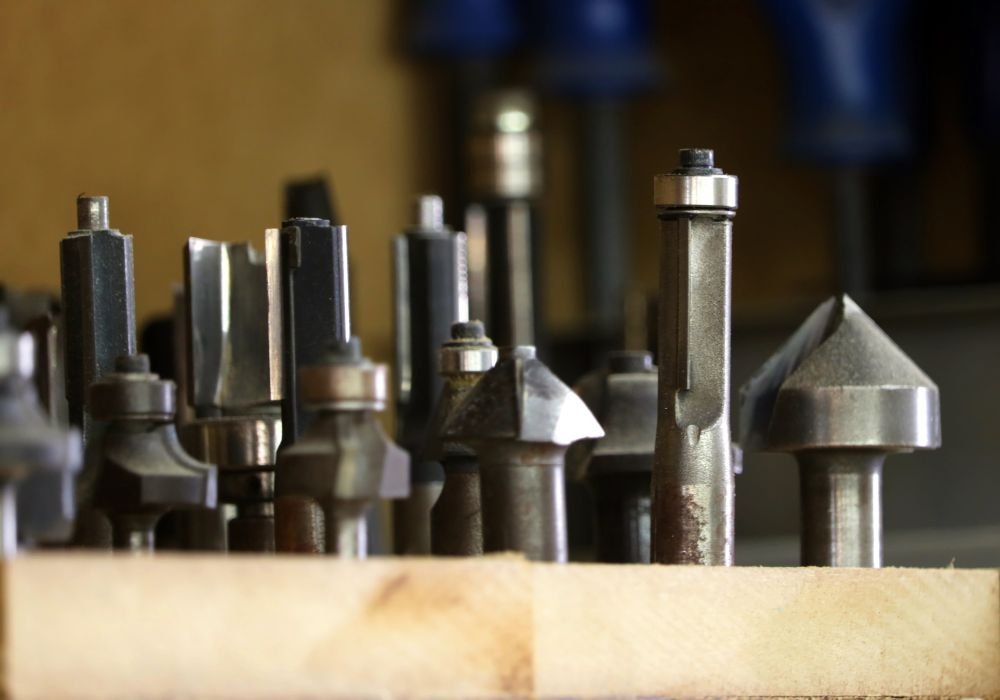 An image of various router bits for a wood router.