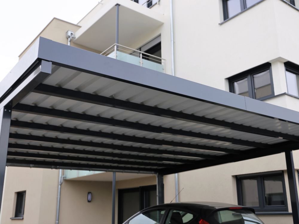 An image of a carport for an article about building covered parking at home.