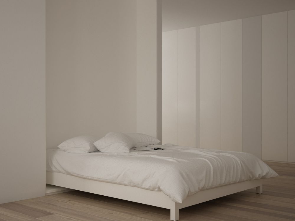 An image of a murphy bed wall installed onto a white wall. 