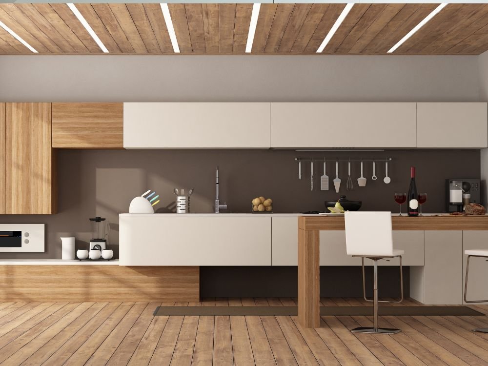 An image of a peninsula kitchen layout with organized kitchen ware. 