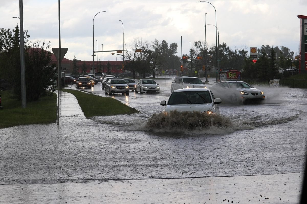 A flooded suburban street in an Australian city.