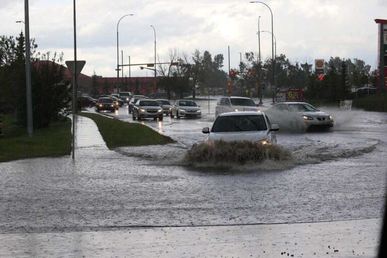 A flooded suburban street in an Australian city.