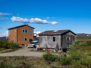 An image of a house for an article about off grid living solutions.