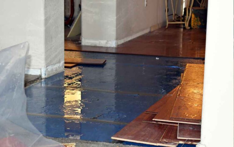 An image of floor getting water damage.