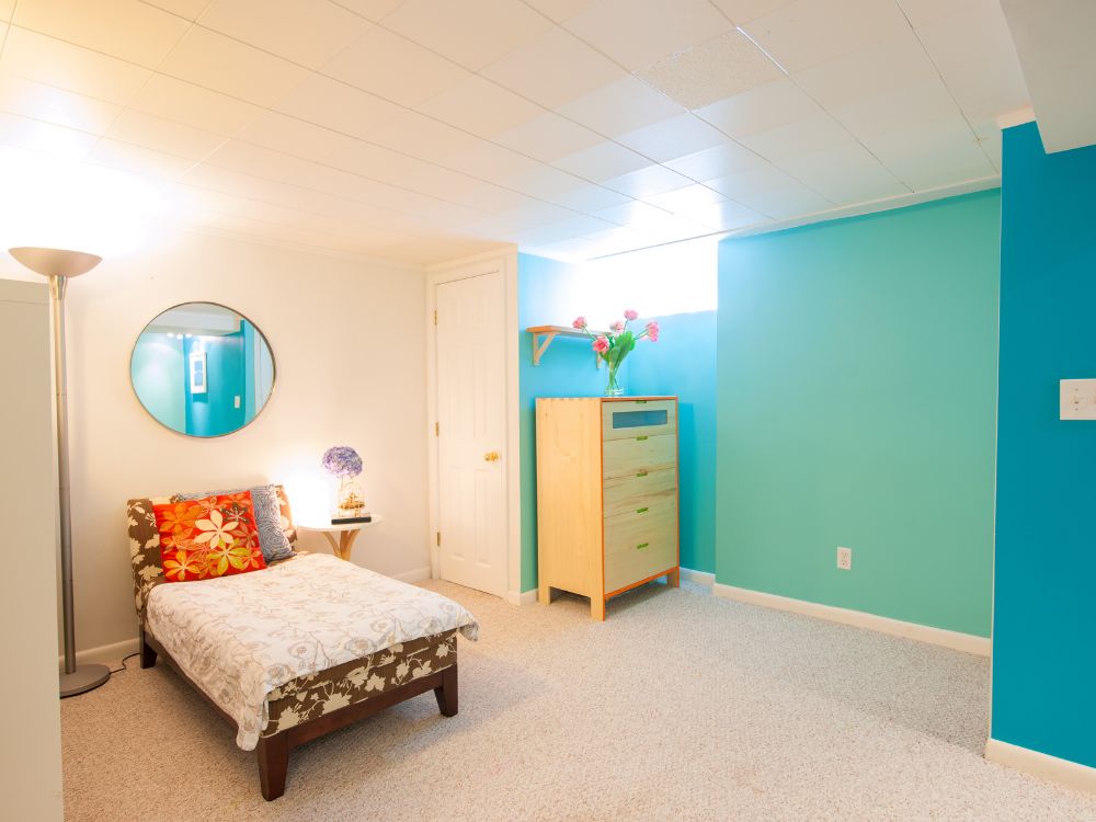 An image of a finished basement turned into an Airbnb property.