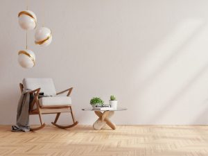 An image of furniture, flooring, and wall paint using neutral colors.