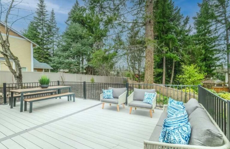 An image of a patio with wooden benches.