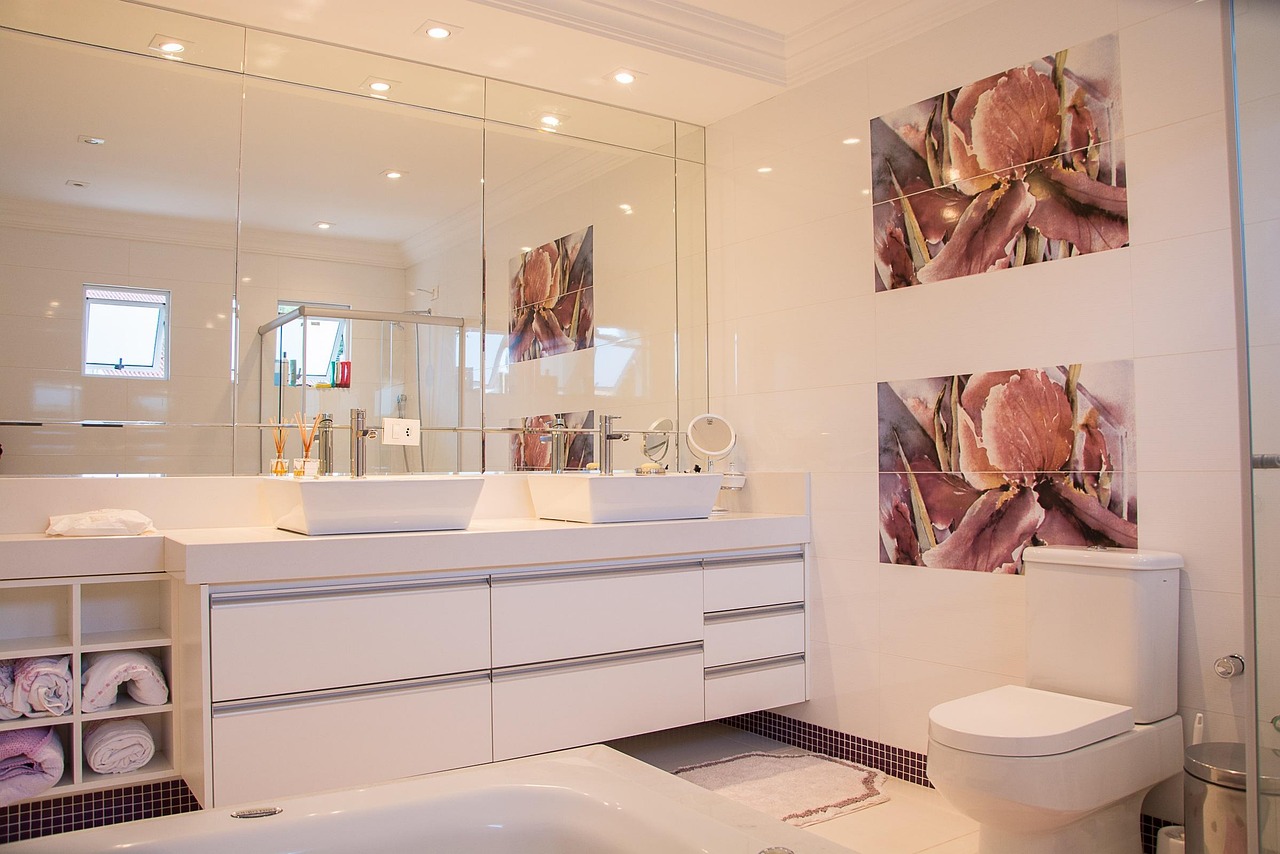 A bright, modern bathroom using large format tiles.