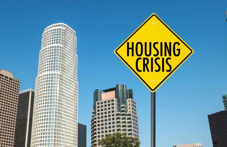 An image of a sign that says housing crisis.