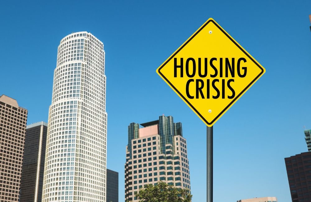An image of a sign that says housing crisis.