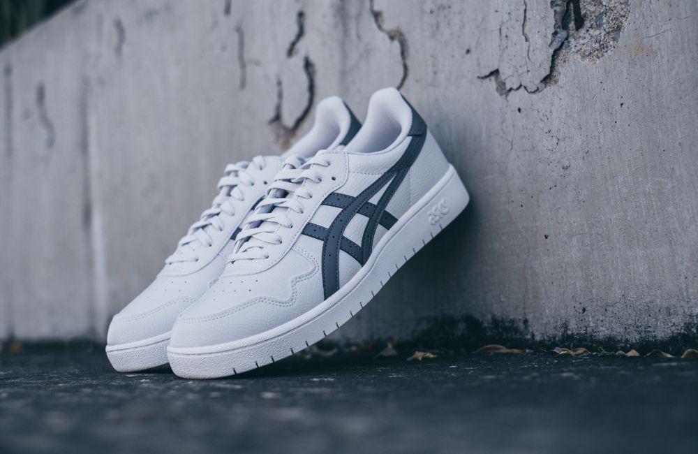 An image of white comfortable shoes. 