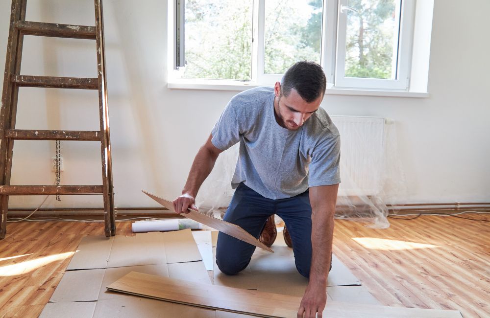An image of a DIYer in the middle of his project. 