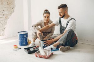 A couiple getting ready to paint a room.