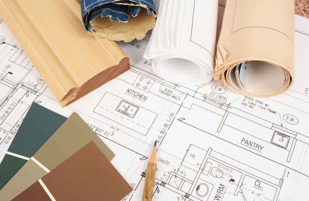 An image of a renovation plan and various materials. 