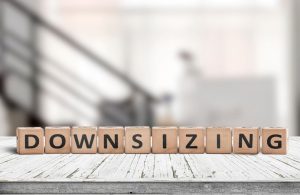 An image of blocks spelling downsizing for an article about home downsizing.
