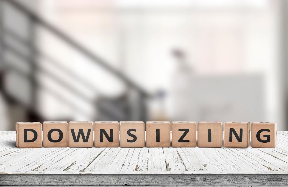 An image of blocks spelling downsizing for an article about home downsizing.