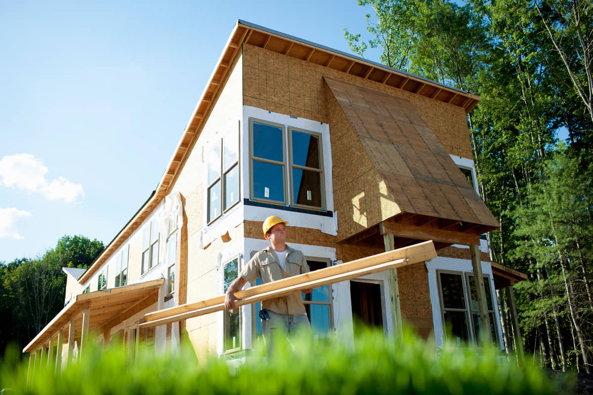 A house under construction using sustainable building materials.