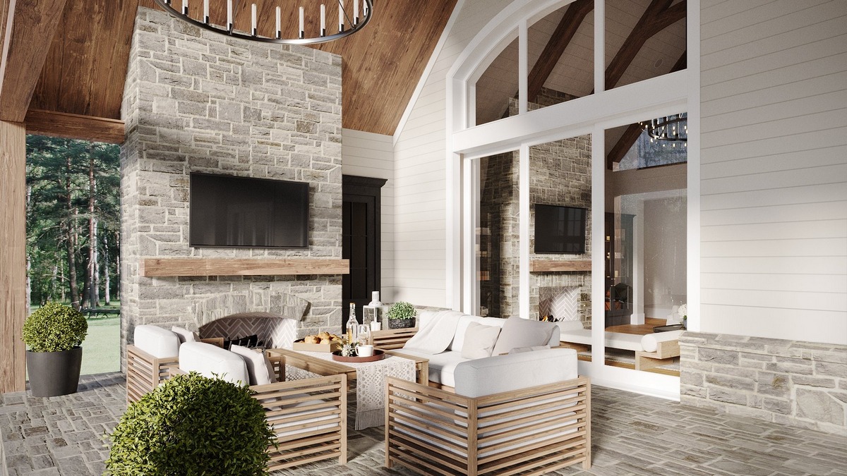 A covered porch deep enough for a sofa set and a table. That kind of depth is easy to add on paper and hard to add once the footings are poured. Image: ArchiCGI.